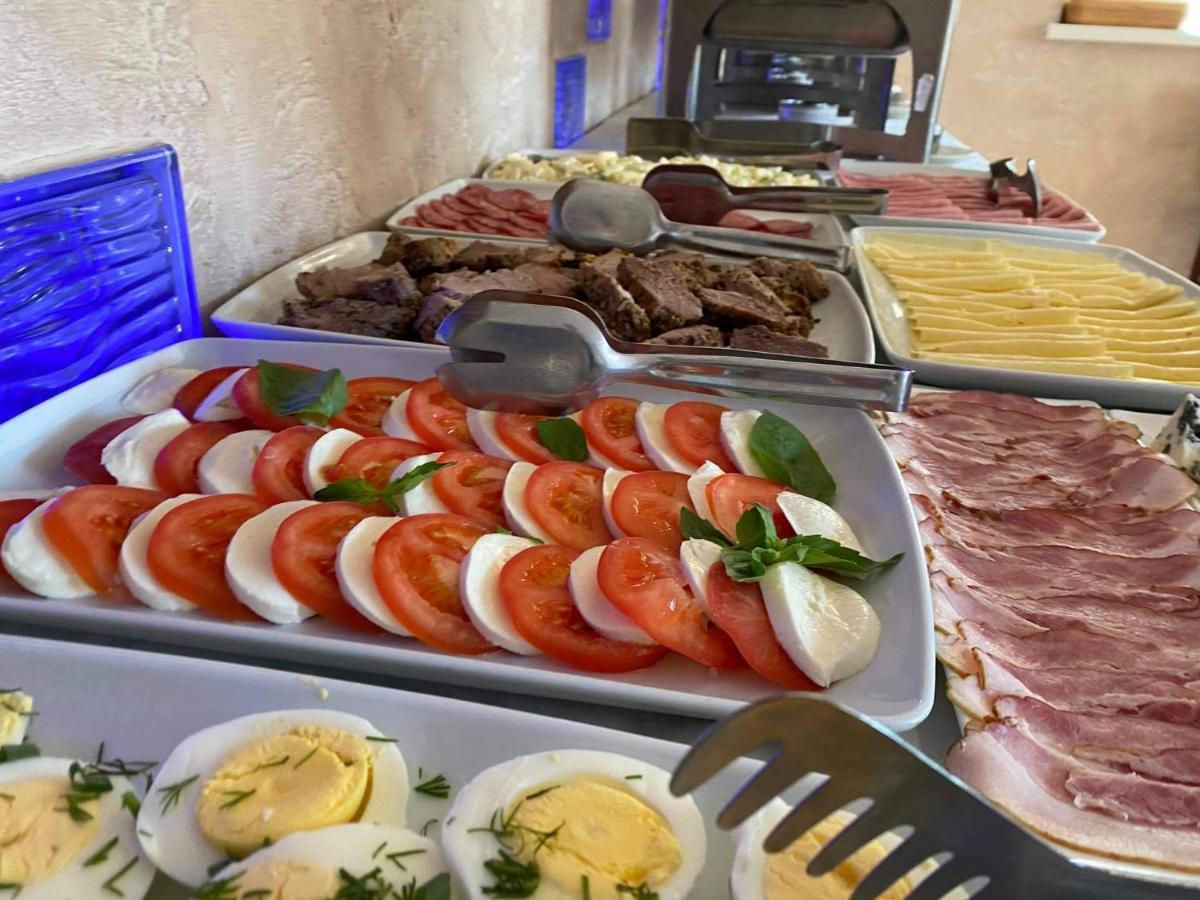 Floros Simfonija Hotel Sventoji Bagian luar foto
