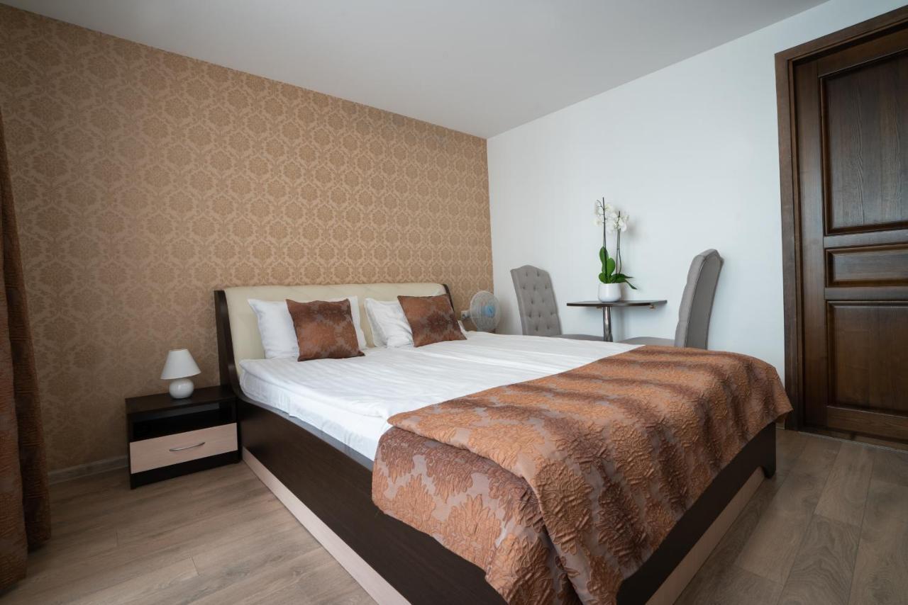 Floros Simfonija Hotel Sventoji Bagian luar foto